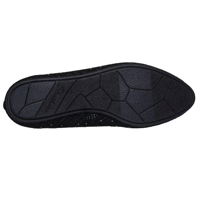 The image displays the black rubber sole of the Womens Skechers Cleo 2.0 Glitzy Daze Ballet Flat, featuring a textured geometric pattern for grip and the brand name embossed on the left side., 50212, 196989721118, 196989721132, 196989721156, 196989721170, 50221