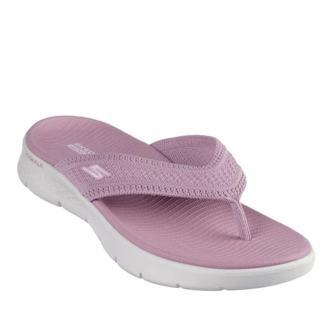 Pink flip flop sandal with white sole on a white background