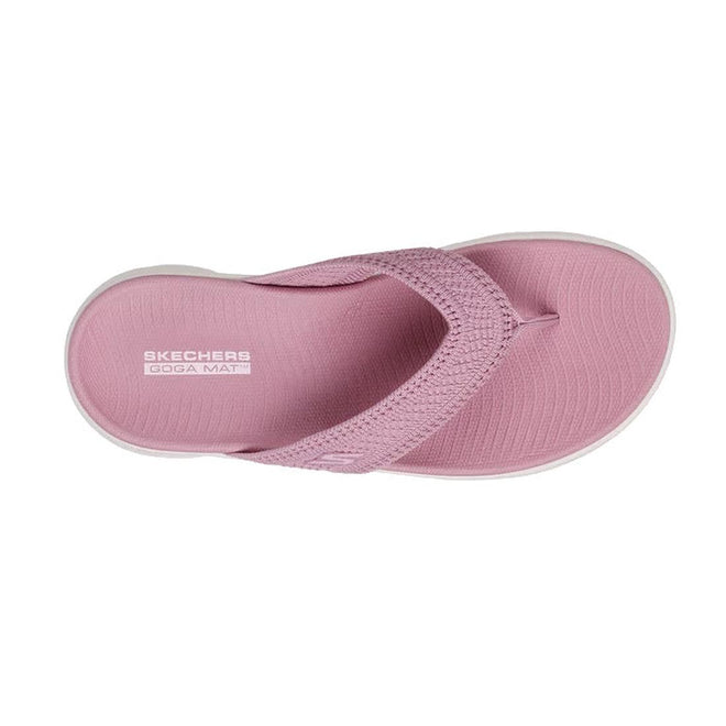 Pink sandal with 'Skechers' branding on a white background, top down view,
198376894474,
198376894481,
198376894498,
198376894504,, 45821, 198376894474, 198376894481, 198376894498, 198376894504, 45826, 45827