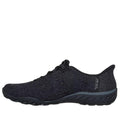 The Skechers Breathe Easy Knitty Waves SLIP IN Black is a slip-on athletic shoe with a textured fabric upper, low profile, black rubber sole, Stretch Fit, and Air-Cooled Memory Foam, shown in side view on a white background., 198376792176, 198376792190, 198376792213, 198376792237, 46778