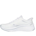 The Skechers Slip In Max Cushioning Elite 2.0 Leigh White Trainer features a mesh upper, textured sole, and white laces, shown in side profile against a plain background. Includes Air-Cooled Memory Foam and Max Cushioning Elite technology for comfort and support., 199025355940, 50114, 199025355964, 50116, 199025355988