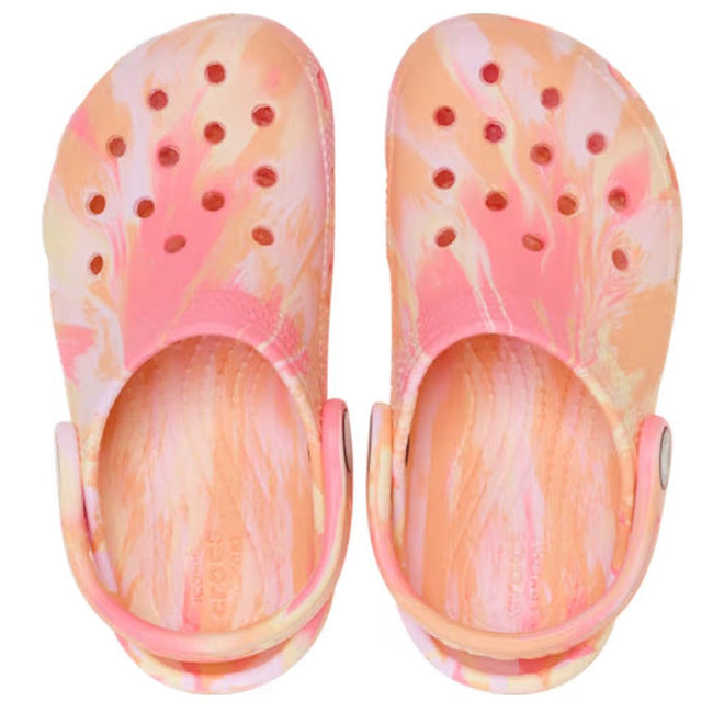 The Crocs Kids Toddlers Classic Clog K Marbled in Guava Pink Multi features a pink, peach, and white tie-dye pattern and is shown from above with heel straps outward., 49874, 198445341021, 198445341038, 198445341045, 198445340987