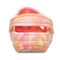 Back view of the Crocs Kids Toddlers Classic Clog K Marbled Guava Pink Multi, showcasing a vibrant orange, pink, and cream marbled pattern with the raised CROCS logo on the heel strap., 49874, 198445341021, 198445341038, 198445341045, 198445340987