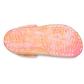 Bottom view of the Crocs Kids Toddlers - Classic Clog K Marbled Guava Pink Multi, featuring a translucent, textured tread and visible Crocs logo—ideal for fans of marbled clogs and stylish kids’ sandals., 49874, 198445341021, 198445341038, 198445341045, 198445340987
