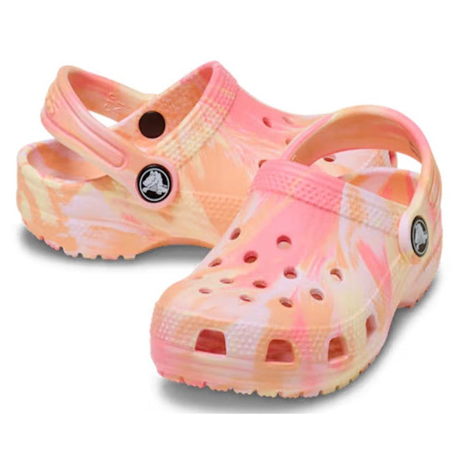 The Crocs Kids Toddlers - Classic Clog K Marbled Guava Pink Multi features a pink, orange, and yellow swirl design with ventilation holes and adjustable heel straps.
