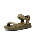 The Woden Line Women's 3 Strap Sandal in Dark Olive features three adjustable straps, Natural Soft technology, a cushioned sole, and a low wedge heel. Shown against a white background.