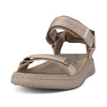 The Woden Line Women's 3 Strap Sandal in Silver Mink features a beige open-toe design with adjustable straps and a cushioned sole for all-day comfort. Shown from a front-side angle on a white background, it's ideal for everyday wear., 48203, 48204, 5713326605235, 5713326605242, 5713326605259, 5713326605266, 48209