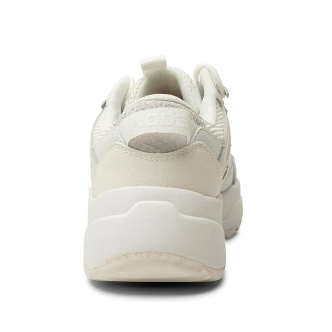 A rear view of the Woden SIF Reflective Women's Sneaker in Blanc de Blanc White, featuring a chunky sole, mesh and leather details, and a heel pull tab, set against a plain white background., 36107, 5713326428612, 5713326428629, 5713326428636, 36110