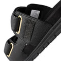 Close-up of the Woden Lisa Women's Leather 2 Strap Sandal in black, featuring chunky buckle straps, textured LWG-certified leather, visible stitching, a thick ridged sole, anatomical footbed, and an inside fabric label., 5713326518276, 5713326518283, 5713326518290, 5713326518306, 5713326518313, 3935713326518320, 5713326518269