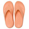 The Crocs Womens Getaway PLATFORM Flip Sandal in Sunstone Orange features wide straps, cushioned soles with Free Feel Technology, and a platform jandal style, shown here as a peach-colored slip-on viewed from above., 49910, 49911, 198445274329, 198445274336, 198445274343, 49915, 49916
