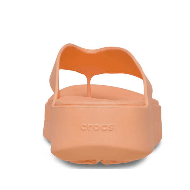 The Crocs - Womens Getaway PLATFORM Flip Sandal in Sunstone Orange features a peach-toned platform heel and Crocs logo on the back strap—making it the perfect stylish jandal from the Getaway Collection., 49910, 49911, 198445274329, 198445274336, 198445274343, 49915, 49916