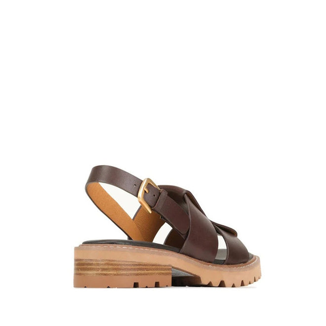 The EOS Womens Leonella Dark Brown Sandal with back strap is shown against a white background. It features cashmere leather, a closed toe, gold buckle, tan rubber sole, and a chunky ridged block heel for added grip and style., 40427, 9321191223438, 9321191223445, 9321191223452, 9321191223469, 9321191223476, 40433