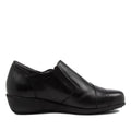 The Ziera Sage XF Women's Wedge Heel Shoe in black leather features a low wedge heel, rounded toe, minimal stitching, and high arch support. Shown in left side profile view against a white background with zip closure detail., 9355342543724, 9355342095629, 9355342095636, 9355342095643, 9355342095650, 9355342095667, 50983