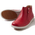 The Ziera Solange XF Leather Women's Ankle Boot in red features an extra wide fit, white rubber sole with textured tread, side zipper, and a removable super support footbed. One boot stands upright while the other shows the sole., 51061, 4434750236376, 4434750236390, 4434750236413, 4434750236437, 4434750236451, 4434750236468
