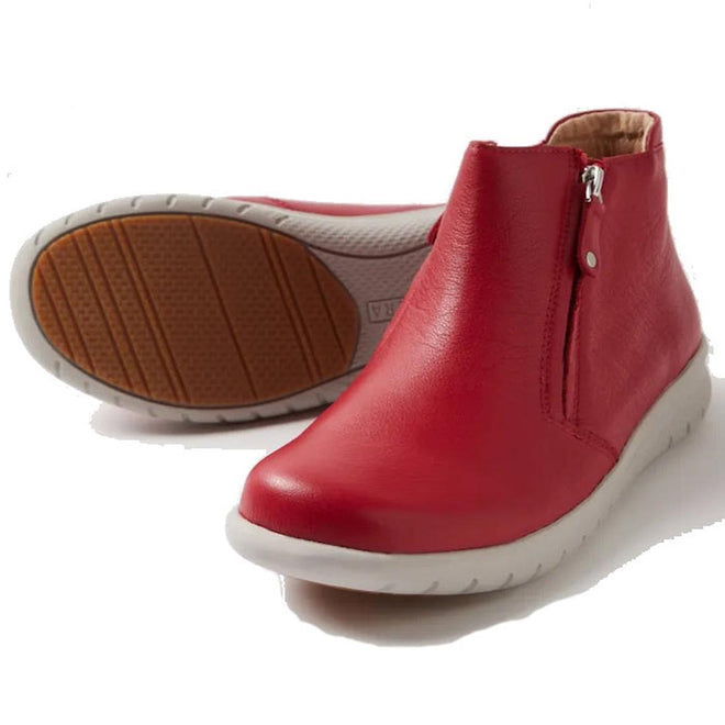 The Ziera Solange XF Leather Women's Ankle Boot in red features an extra wide fit, white rubber sole with textured tread, side zipper, and a removable super support footbed. One boot stands upright while the other shows the sole., 51061, 4434750236376, 4434750236390, 4434750236413, 4434750236437, 4434750236451, 4434750236468