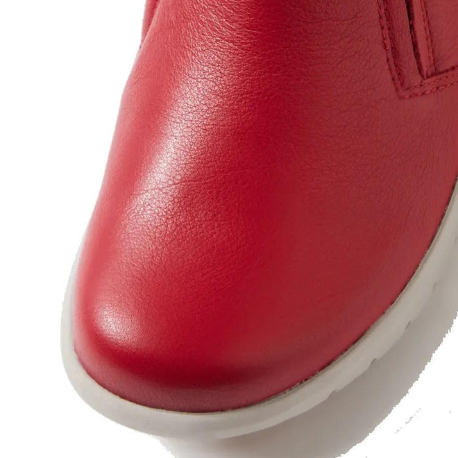 Close-up of the toe area of the Ziera Solange XF Leather Women's Ankle Boot in red, featuring textured leather and detailed stitching on a white sole—perfect for extra wide fit., 51061, 4434750236376, 4434750236390, 4434750236413, 4434750236437, 4434750236451, 4434750236468