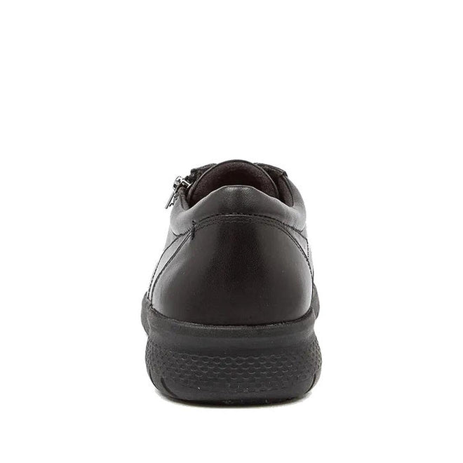 Back view of the Ziera Solar XW Women's Casual Sneaker Zip in black leather, offering high arch support and a textured rubber sole, photographed against a white background., 50991, 9355342550562, 9355342550579, 9355342550586, 9355342551439, 9355342551477, 9355342551491