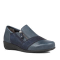 The Ziera Sage XF Women's Wedge Heel Shoe in navy leather features a low wedge heel, textured sides, smooth leather toe and heel, high arch support, and a side zipper for easy wear.