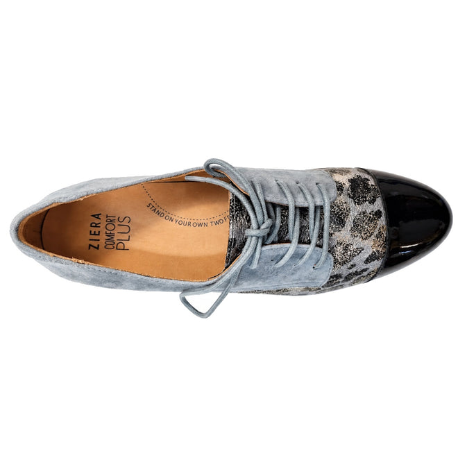 A top view of the Ziera Tobin XF Women's Flat Brogue shows a lace-up oxford with a light blue suede body, black patent leather toe cap, grey leopard print sides, tan branded insole, and a removable Comfort Plus footbed., 4434755462862, 4434755462879, 4434755462886, 4434755462893, 4434755462909, 4434755462916, 51053