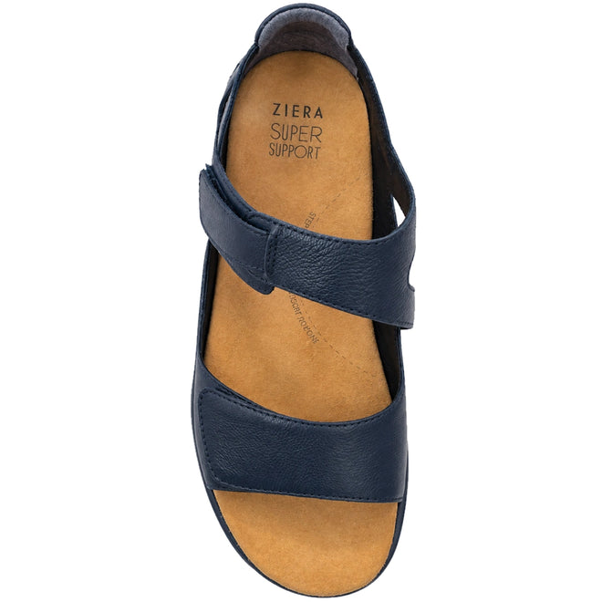 A top-down view of the Ziera Bopen Navy XW Women’s Leather Closed Back Sandal, featuring two adjustable straps, a wide fit design, and a tan cushioned insole labeled Ziera Super Support.