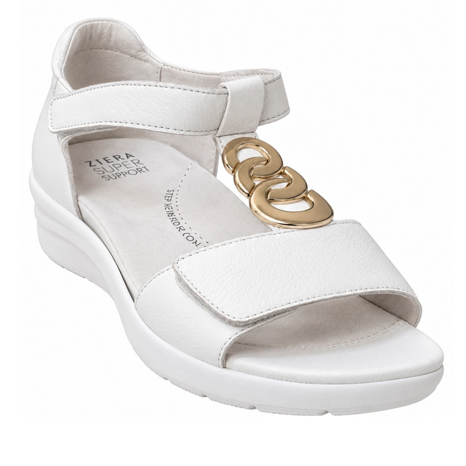The Ziera Nextime White Women’s Leather Sandal XW Closed Back features a white leather upper with an open toe, thick sole, adjustable ankle strap, and gold chain embellishment. The insole displays the Ziera SUPER SUPPORT text and is designed for orthotic compatibility—making it ideal for those seeking wide fit shoes from the Ziera Nextime collection.