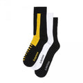Image of right foot, side on of Dr Martens Socks Double Doc Sock Unisex Black White Yellow-Foot Forward Shoes
