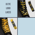 Image of right foot, side on of Dr Martens 140cm Flat Logo - 8 Eye-Foot Forward Shoes