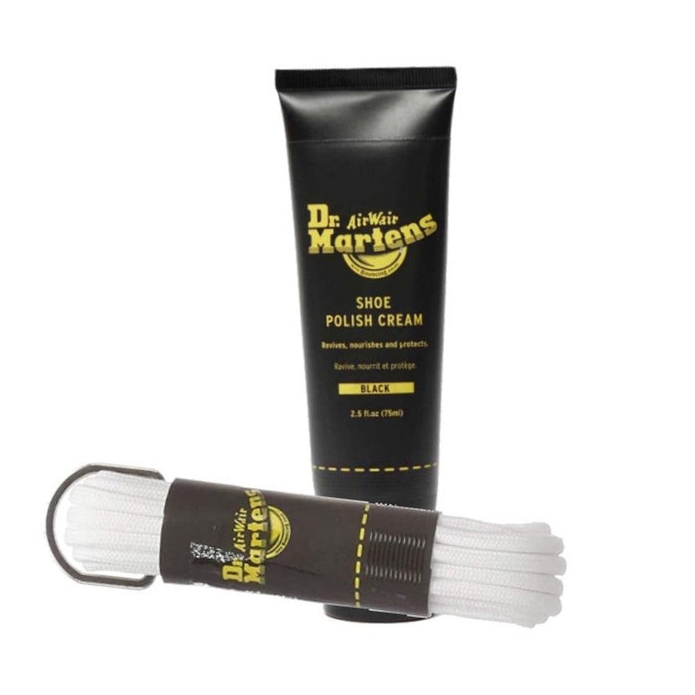 Image of right foot, side on of Dr Martens Polish Black Plus 8-Up White Round Laces 8 Ups-Foot Forward Shoes