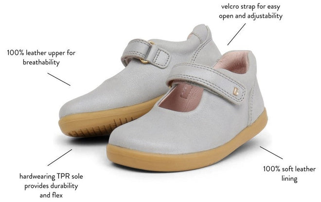 Bobux Iwalk Delight Mary Jane Navy 628026A: Navy children’s shoes with leather upper, soft pink leather lining, adjustable velcro strap, and durable flexible tan TPR soles. Labels highlight comfort and flexibility features., 9420062056028, 9420062056035, 9420062056042, 9420062056059, 9420062056066