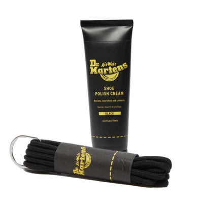 Image of right foot, side on of Dr Martens Polish Black Plus 8-Up Black Laces-Foot Forward Shoes