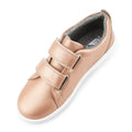 The Bobux Kids + Plus Grass Court Rose Gold Velcro Trainers 832455 feature a leather upper, double Velcro straps, white sole, and gray lining, displayed from an angled top view., 9420071315741, 9420071315758, 9420071315765, 9420071315772, 9420071315789, 9420071315802, 9420071315796