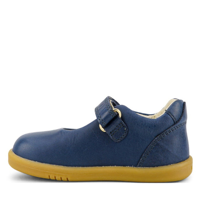 The Bobux Iwalk Delight Mary Jane Midnight Blue 628048 shoe, featuring a leather upper, velcro strap, and light brown rubber sole, is shown in profile facing left against a white background., 9420068516748, 9420068516755, 9420068516762, 9420068516779, 9420068516786