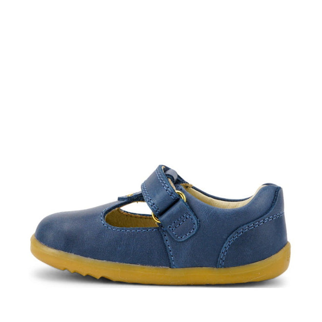 The Bobux Step Up T-Bar Louise Midnight Blue 728330 is a toddler shoe with a blue leather upper, yellow rubber sole, classic T-bar design, and easy velcro strap for fastening., 9420068521810, 9420068521827, 9420068521834