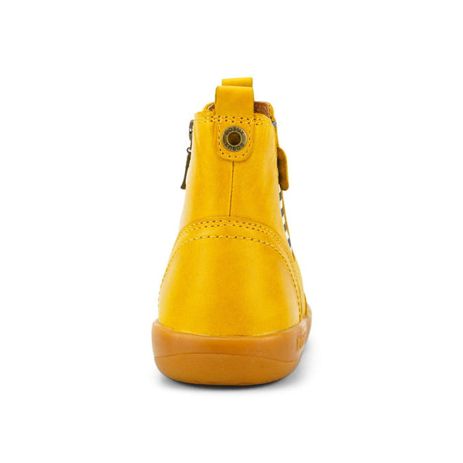 The Bobux Kid+ Jester Jodphur Boot in Chartreuse Yellow is shown from the back with a rubber sole, visible stitching, pull tab, and side zipper—blending modern style with classic jodhpur boot details. Plain white background., 9420068520868, 9420068520875, 9420068520882, 9420068520899, 9420068520905, 9420068520912, 9420068520929