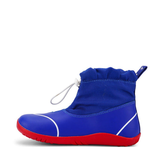 A single Bobux Kid+ Splash Boot Waterproof Blueberry 839003, ankle-high kids shoe with a bright blue upper, red sole, white detailing, and a white toggle drawstring at the top, is photographed on a plain white background., 9420068527911, 9420068527928, 9420068527935, 9420068527942, 9420068527959, 9420068527966, 9420068527973