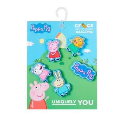The Crocs Jibbitz 5 Pack - Peppa Pig features charms of Peppa, George, Suzy Sheep, and Rebecca Rabbit on a colorful background with a house, trees, and "UNIQUELY YOU"—a fun way to decorate your Crocs!.