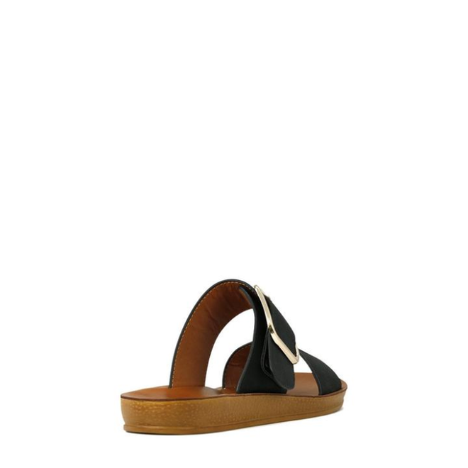 The Los Cabos Doti Black Light Flexible-Sandal features a black strap with a large metallic buckle, brown sole, and low wedge heel—stylish and comfy for summer. Shown from the back on a white background., 9321191045450, 9321191045467, 9321191045474, 9321191045481, 9321191045498, 9321191045504, 9321191045511