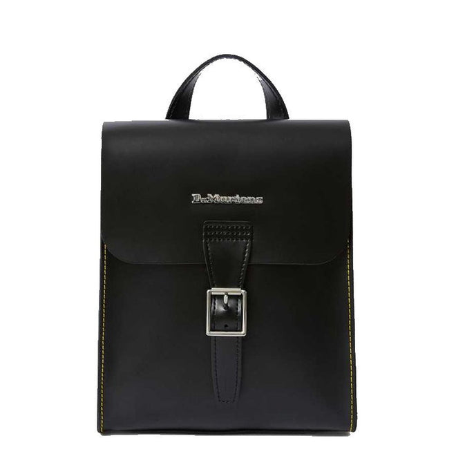 Image of right foot, side on of Dr Martens Mini Leather Backpack Black-Foot Forward Shoes
