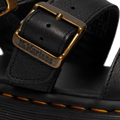 A close up shot of the detailing on the buckle of a Dr Martens Gryphon Quad showing the Dr Martens branding.,
190665318654,
190665318661,
190665318678,
190665318685,
190665318692,
190665318708,
190665318715,