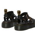 A rear shot of a pair of Dr Martens Gyrphon Sandals in Black shing teh dr martens branded pull tabs, yellow stitching around the sole and slightly platformed sole.,
190665318654,
190665318661,
190665318678,
190665318685,
190665318692,
190665318708,
190665318715,