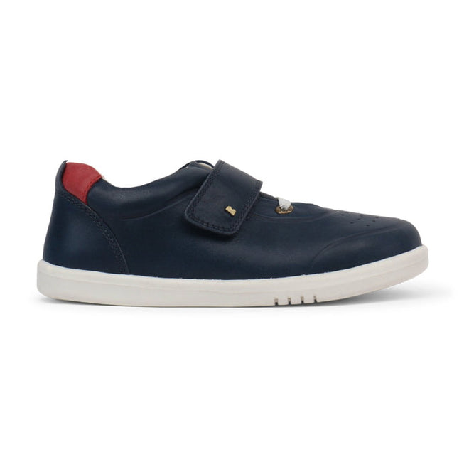 The Bobux Kids + Plus Ryder Navy Velcro Trainers 835602 feature a navy design with a white sole, red heel accent, and a single velcro strap, making them easy for kids to fasten., 9420062043059, 9420062043066, 9420062043073, 9420062043080, 9420062043097, 9420062043103, 9420062043110