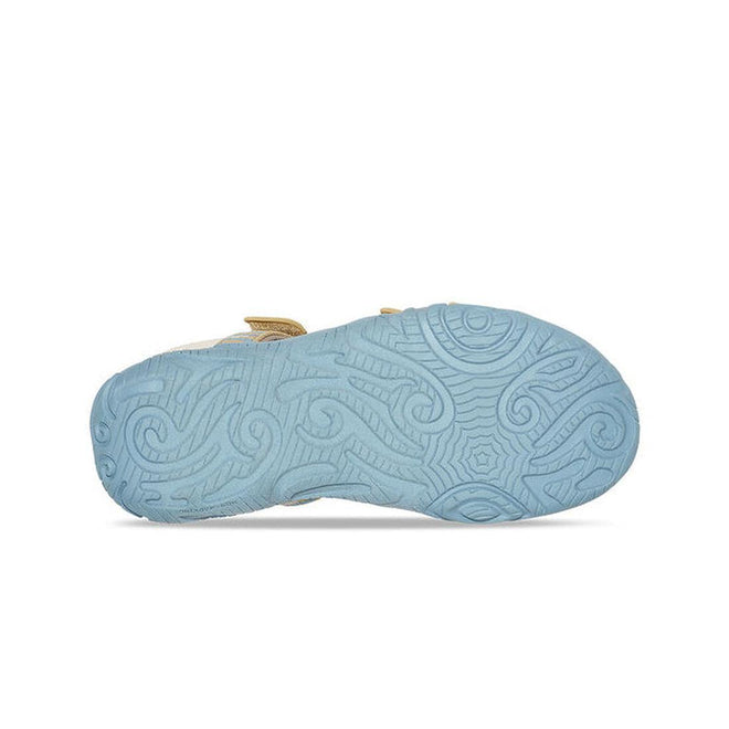 The Teva Girls Active Sandal K Tirra STACKS COCOON is shown from the bottom, featuring a light blue rubber sole with an intricate swirl pattern—ideal for vegan footwear with quick-dry webbing, set against a plain white background., 195719341305, 195719341350, 195719341329, 24599, 24600, 24601, 195719341497, 195719341473, 195719341480, 195719341466