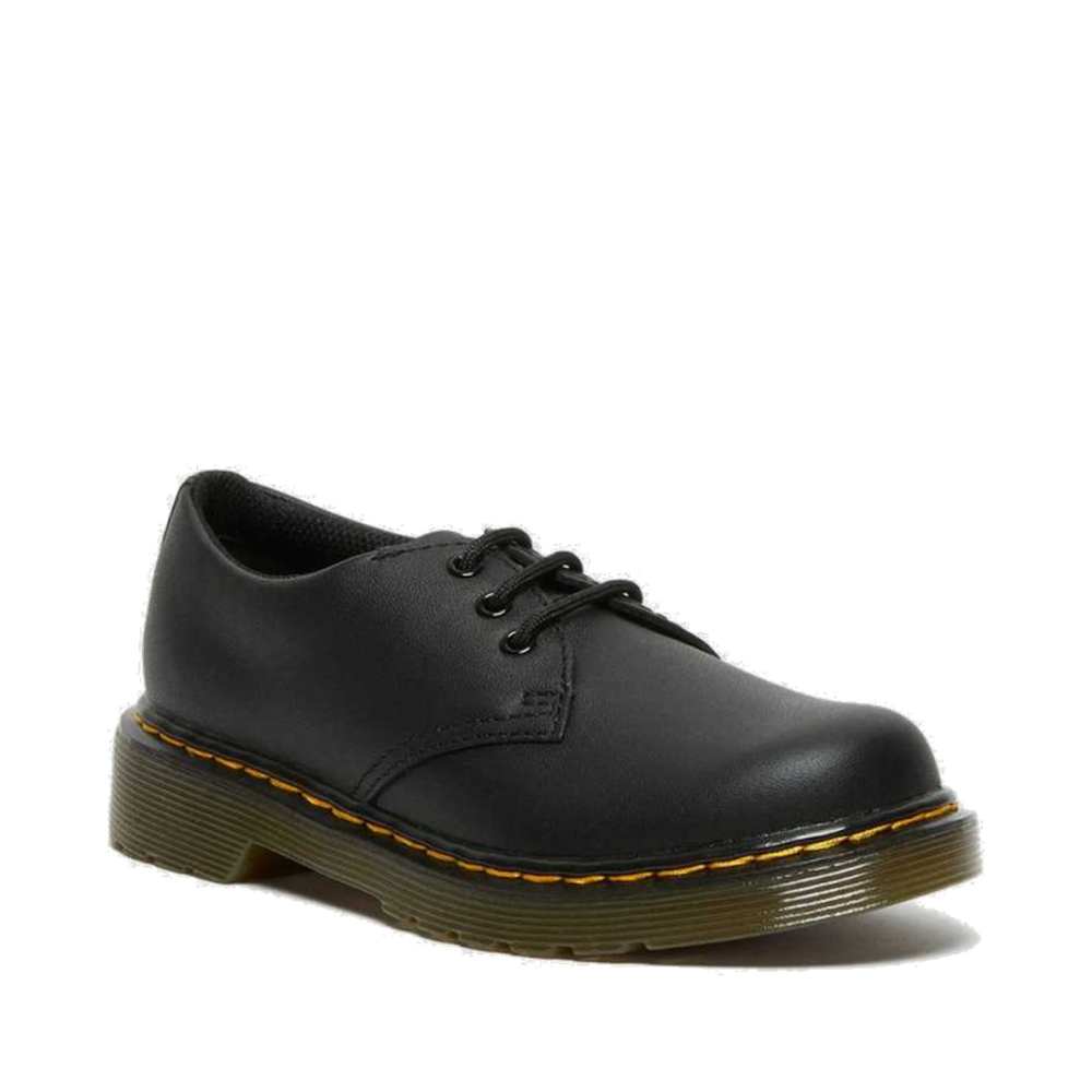 Image of right foot, side on of Dr Martens Kids 1461 J Black School Shoe-Foot Forward Shoes