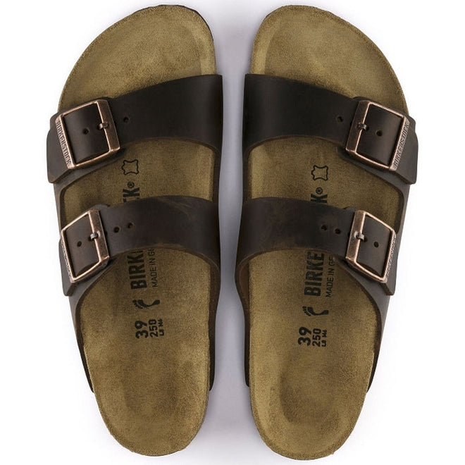 Top down view of a pair of Habana Brown Arizona Oiled Leather Regular width Slides showing the 2 straps across the top of the foot, adjsutable buckles and suede foot
bed.,
4040714437408,4040714437392,4040714437415,4040714437422,4040714437439,4040714437446,4040714437453,4040714437460,4040714437477,4040714437484,4040714437491,4040714437507,
