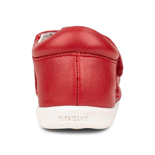A close-up rear view of the Bobux IWalk Tidal Closed Toe Quick Dry Sandal Red 634411, a children's shoe in red leather with a white sole, embossed BOBUX branding on the heel, and a durable quick dry closed-toe design., 9420062023778, 9420062023785, 9420062023792, 9420062023815, 9420062023808