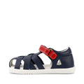 The Bobux Iwalk IW Tropicana II Sandal 638309 in navy features a closed toe, quick dry leather, white sole, ventilating cutouts, red velcro strap across the top, and a small white triangle detail near the heel—perfect for kids., 9420068529779, 9420068529786, 9420068529793, 9420068529809, 9420068529816