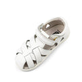 A single Bobux Iwalk IW Tropicana II Sandal 638307 in white, featuring a closed toe, woven quick-dry leather straps, hook-and-loop fastener, soft inner lining, and flexible sole., 9420068509658, 9420068509665, 9420068509672, 9420068509689, 9420068509696