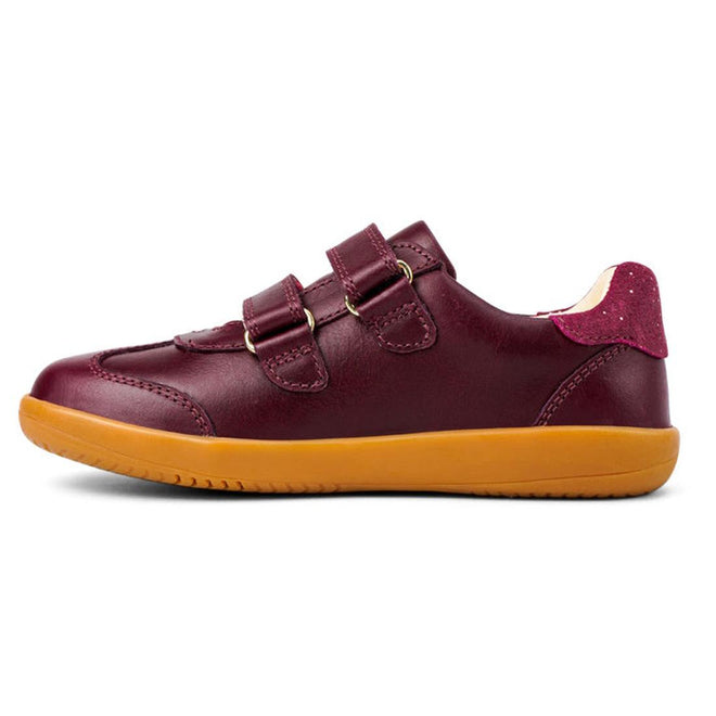 The Bobux Kids Plus KP Sprite Sneaker in Boysenberry features a maroon leather upper, unisex design, three velcro straps, tan rubber sole, and pink suede heel accent, displayed in a left-facing side view., 29968, 9420071316663, 9420071316670, 9420071316687, 9420071316694, 9420071316700, 9420071316717