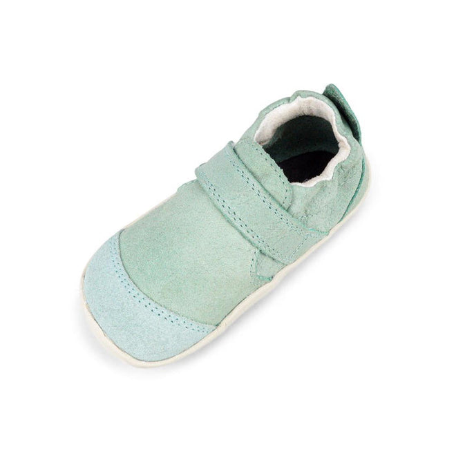 The Bobux XP Xplorer Marvel Mist Blue Dress Shoe First Walker 501227 is a single mint green baby shoe made from soft sheep leather with a scuff-resistant suede toe cap, rounded flexible sole, hook-and-loop strap, and white lining on a white background., 9420071309627, 9420071309634, 9420071309641