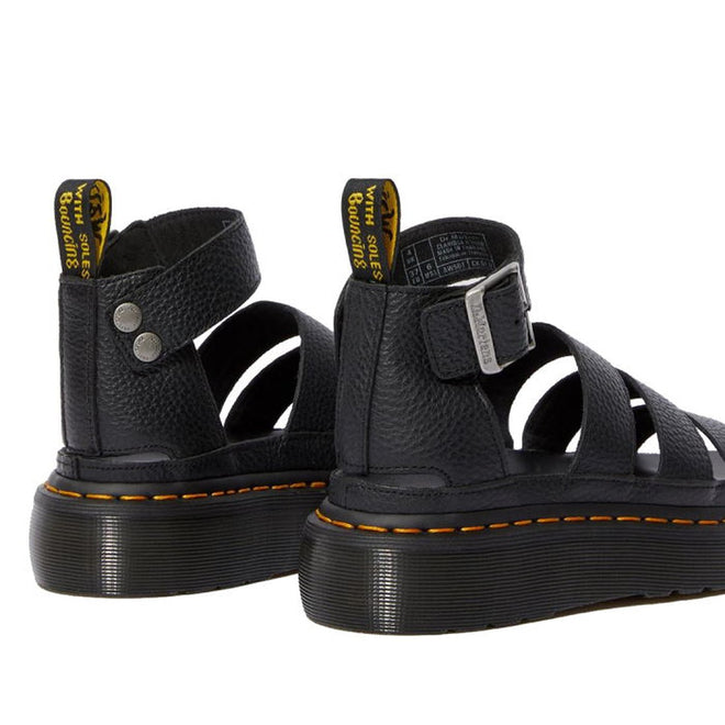 A view showing the heel detail backing of teh Dr Martens quad Clarissa in Black. Rear to front view. Showing chrome like buckle and 2 rivits on the other end of the strap.190665248197,
190665248203,
190665248210,
190665248227,
190665248234,
190665248241,
190665248258,
190665248180,